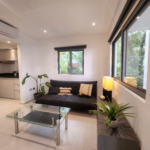 Playa homes for sale - Modern Turnkey 1 Bedroom Condo for Sale in Playacar, Ground Floor Corner Unit - horizontal akab living