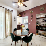 Playa homes for sale - Spacious Colonial Style 1 Bedroom Condo for Sale Ground Floor Oasis in Downtown Playa del Carmen - comedor blanco paraiso 1
